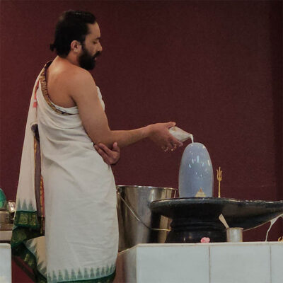 abhiṣekam